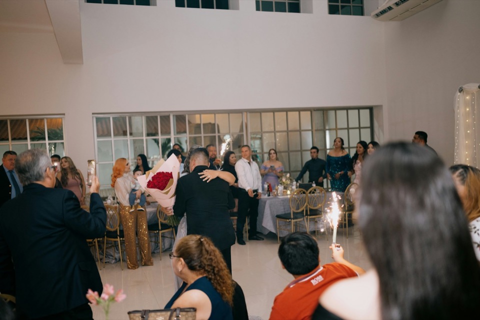 Couple sharing a joyful first dance.
